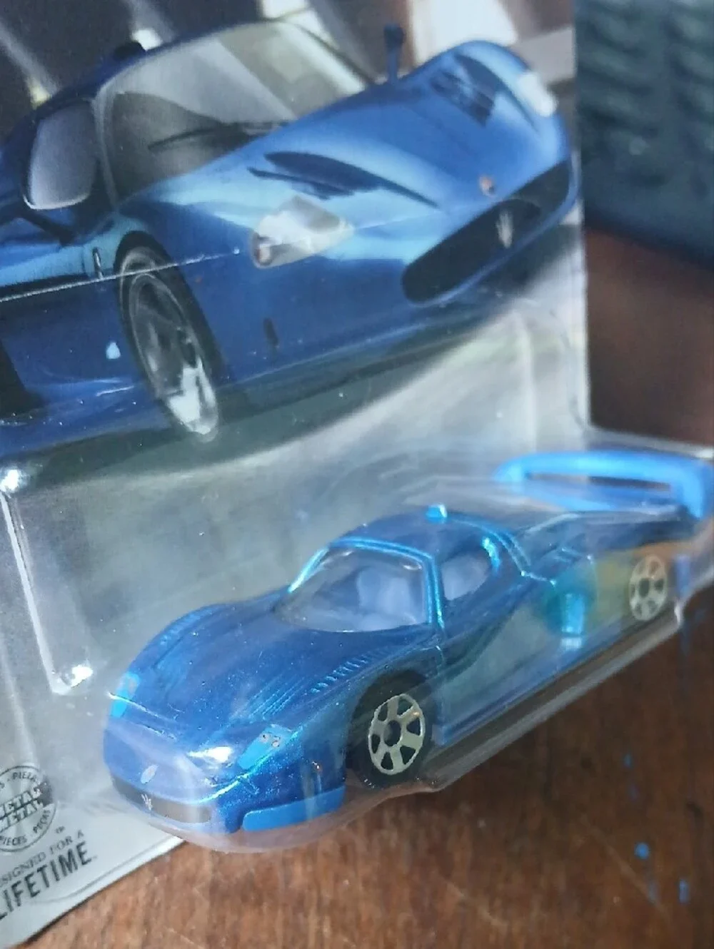 Match blue Maserati MC12 die-cast sports car